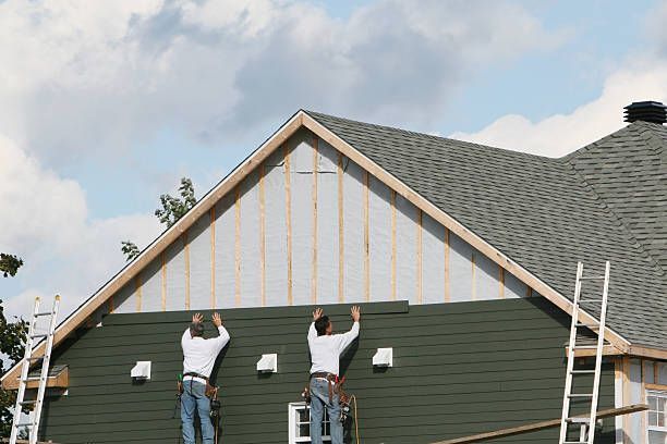 Professional Siding Contractor technician working in Parksley, VA